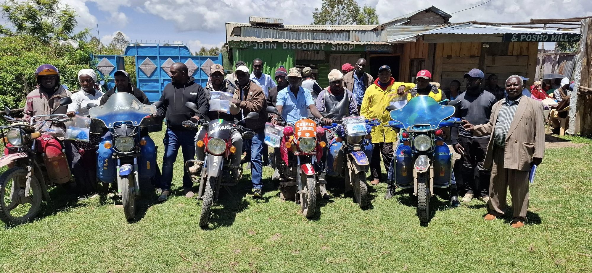 Boda boda riders with their motorbikes and first aid kits