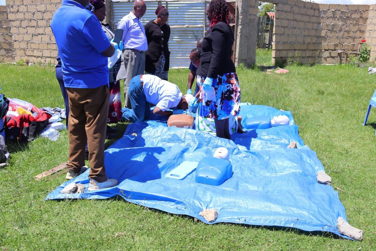 Trainees practising CPR on manikins